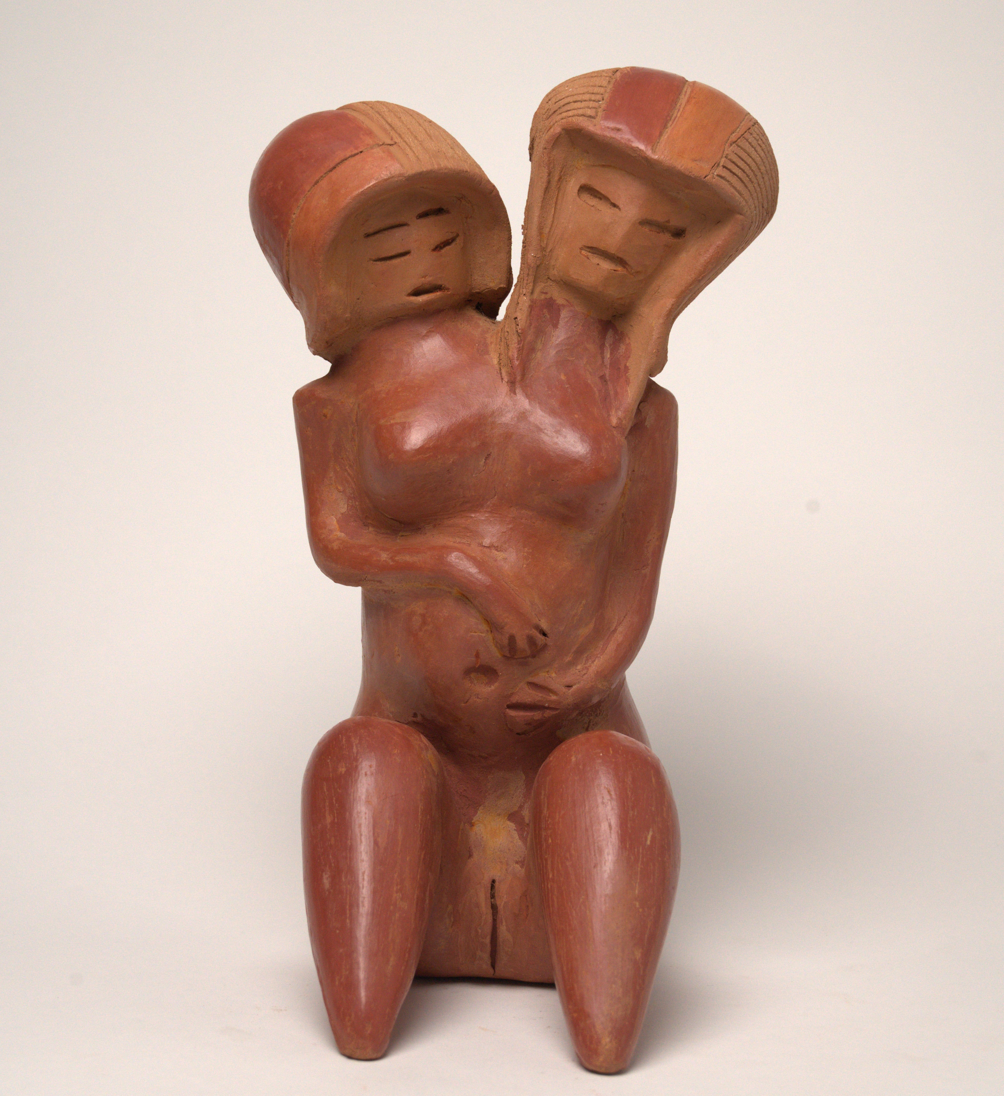 Valdivia de 2 cabezas sentada